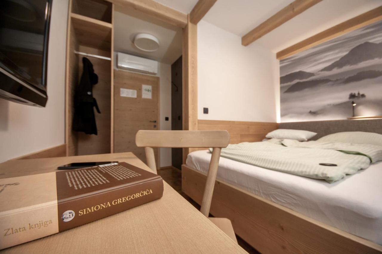 Guesthouse Pri Zalogarju Zelezniki Bagian luar foto