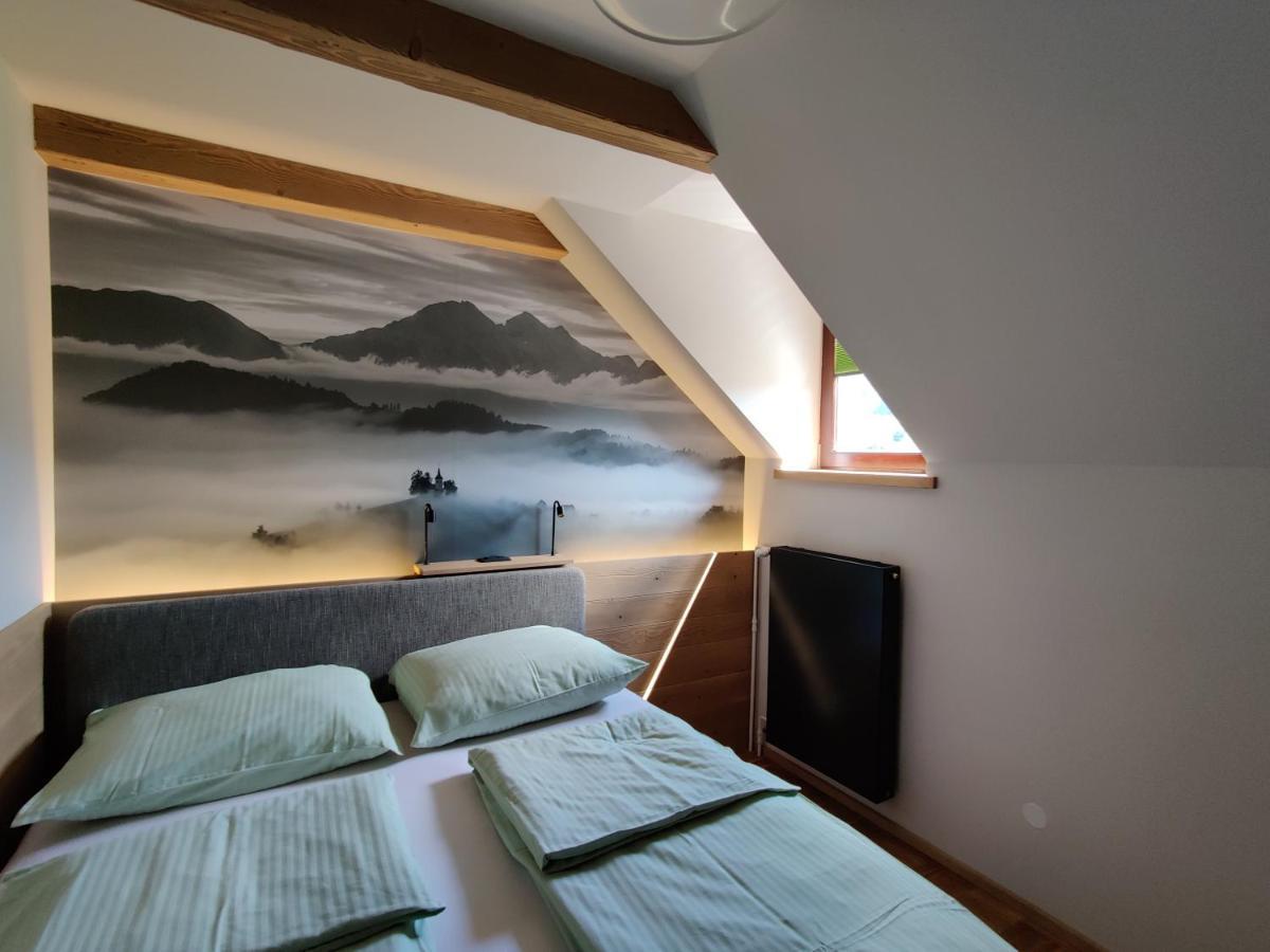 Guesthouse Pri Zalogarju Zelezniki Bagian luar foto